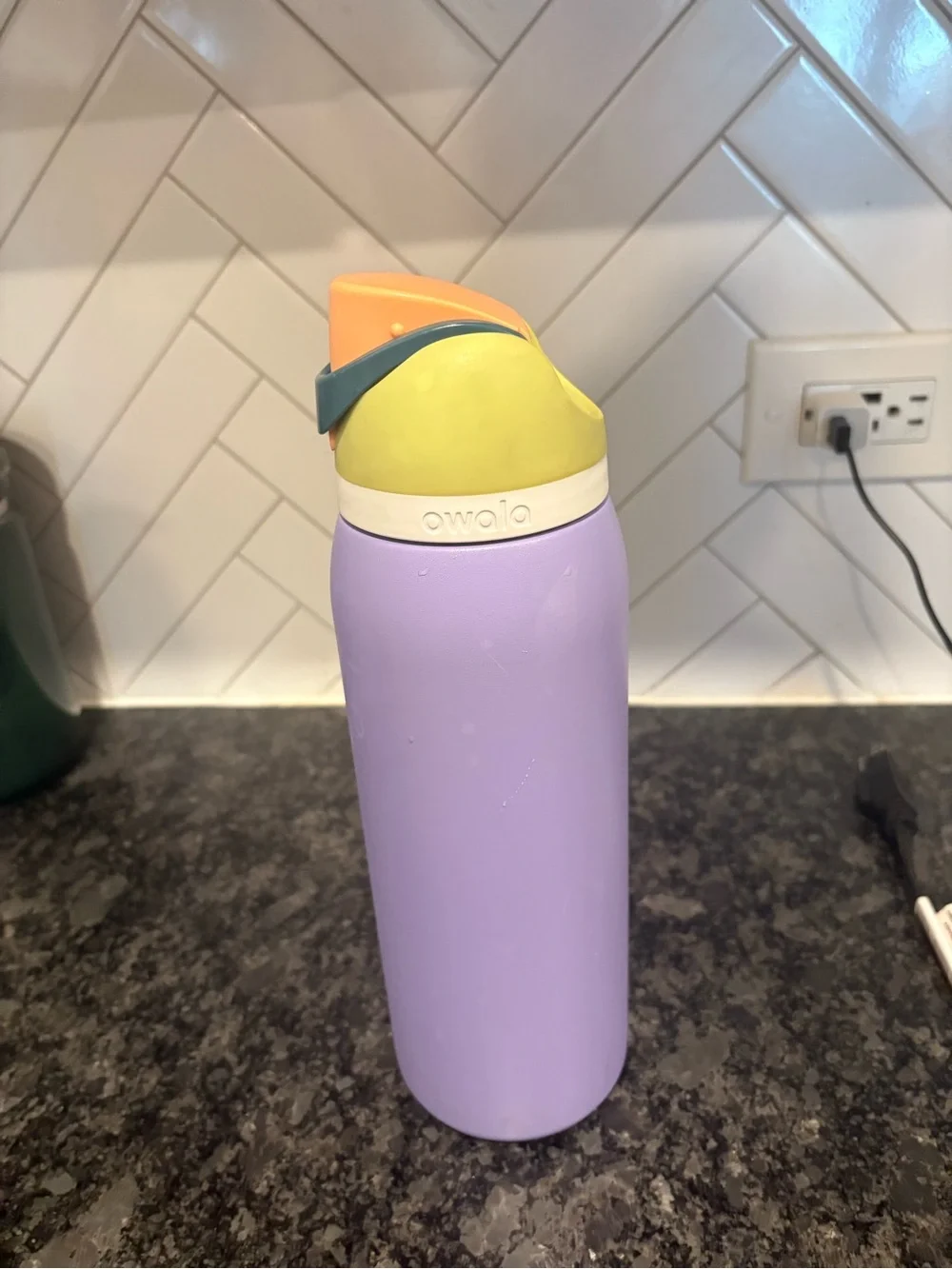 Owala Lavender Stainless Steel Bottle with Yellow & Orange Cap